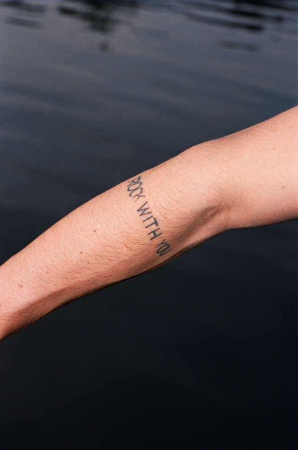 tatovering op arm med skrift
