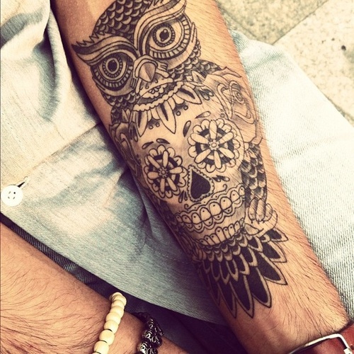 ugle tattoo på underarm